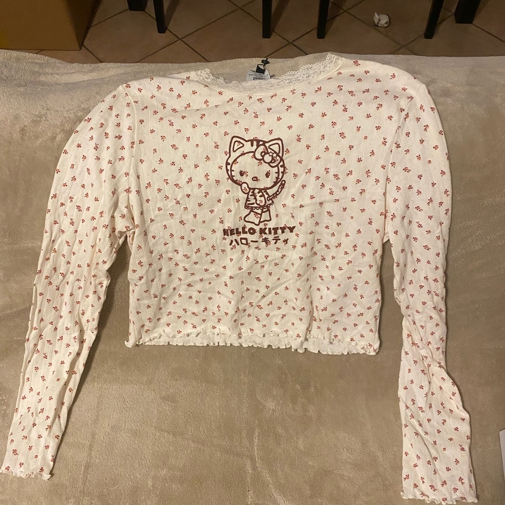 New Girl Order x Hello Kitty floral long sleeved ribbed crib top with lace neck